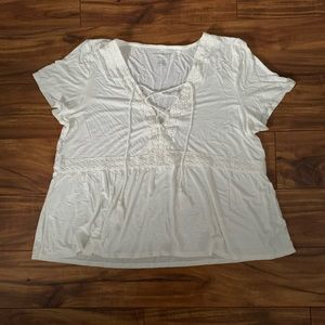 Flowy white shirt with crochet detail